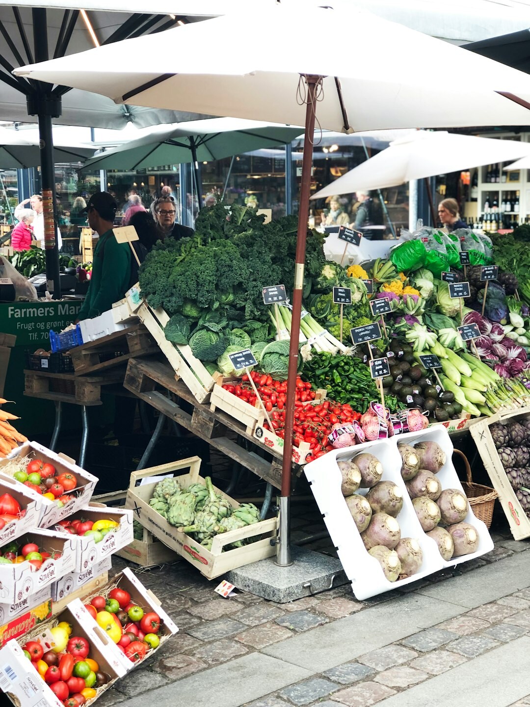 Local outdoor market stall with fresh produce in Denmark